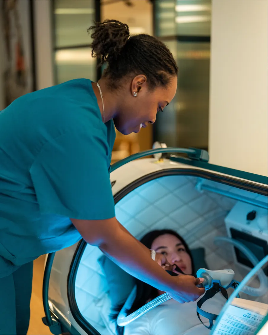 A patient undergoing a hyperbaric oxygen therapy session